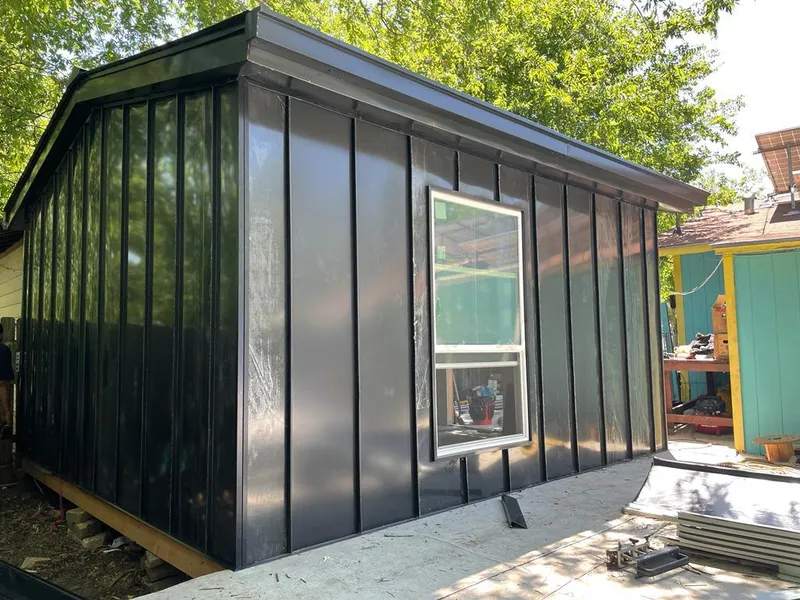 Black standing seam metal wall panels for Roof Inspection in Murrysville